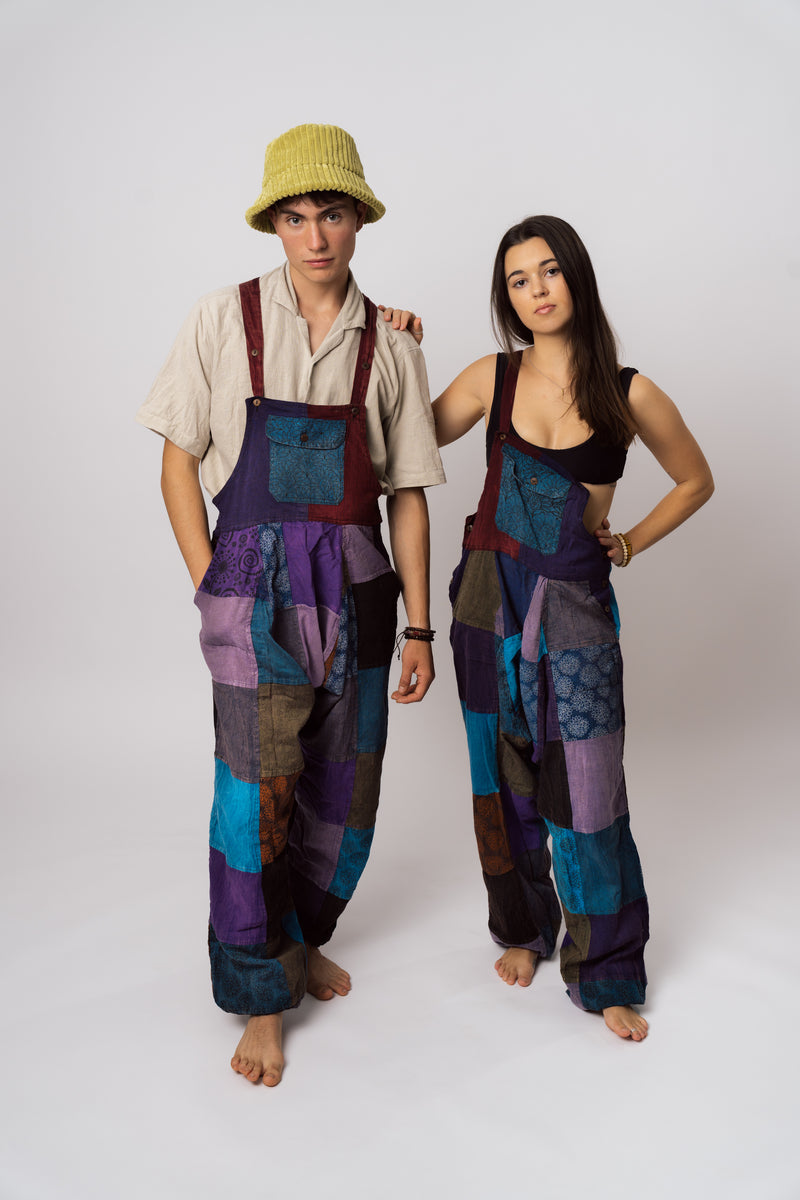 Two models wearing amethyst patchwork dungarees full length