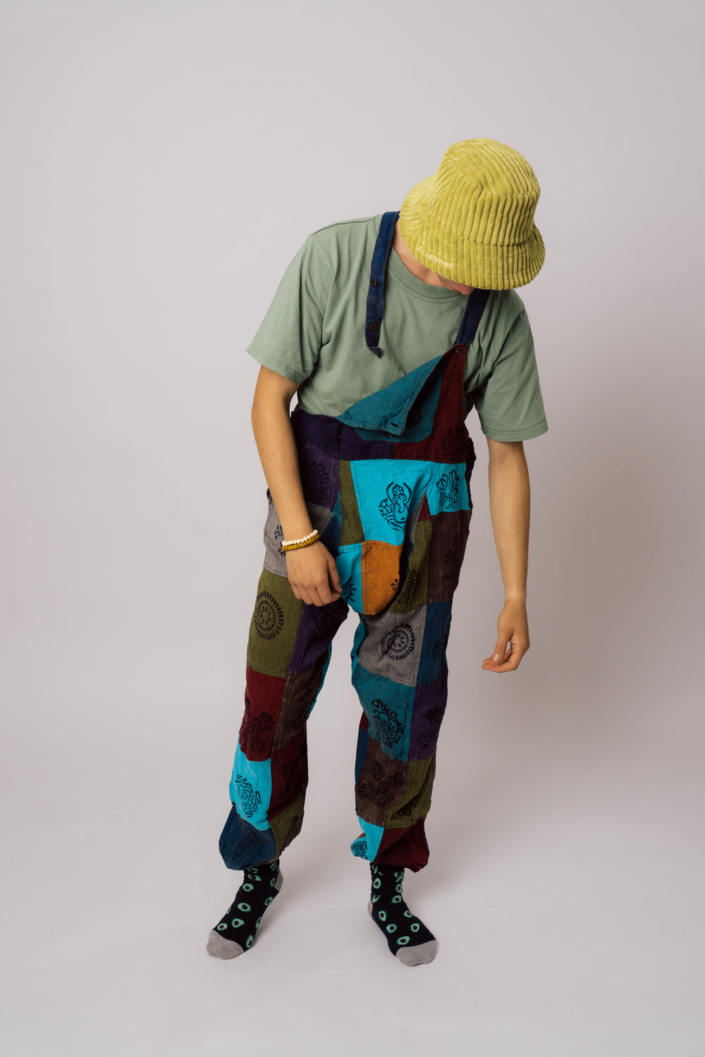 Patchwork overalls on male model