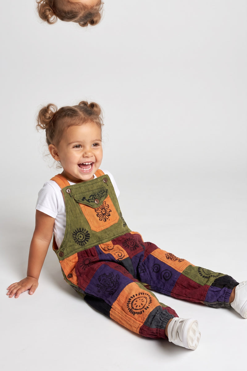 Kids Patchwork Dungarees — sitting