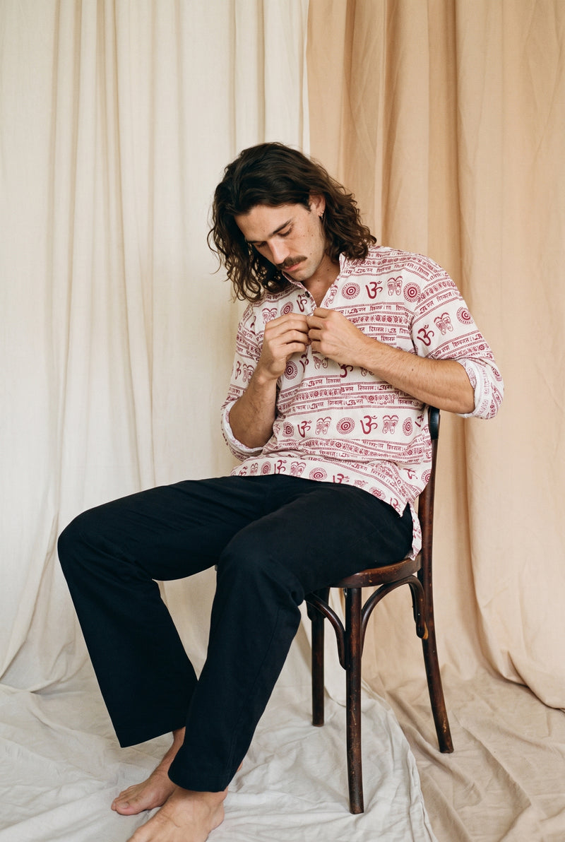 Reed wearing the OM Nepalese Shirt, studio