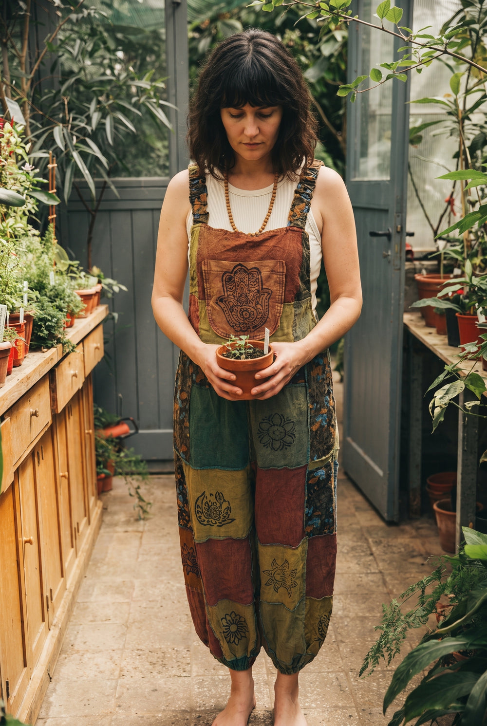 Ana wearing the Wattlewood Overalls, plant room