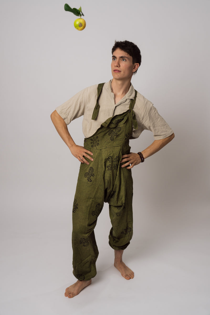 Handmade green dungarees worn on model showing full length