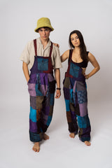 Two models wearing amethyst patchwork dungarees full length