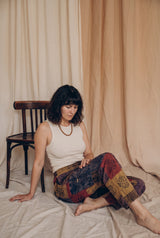 Ana wearing the Emberglow Patchwork Pants, studio
