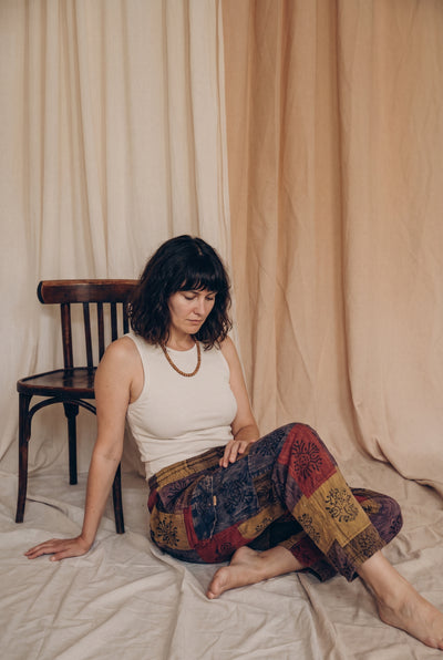 Ana wearing the Emberglow Patchwork Pants, studio #coll:female-pants #coll:womens-bottoms-pants #coll:boho-womens-clothing