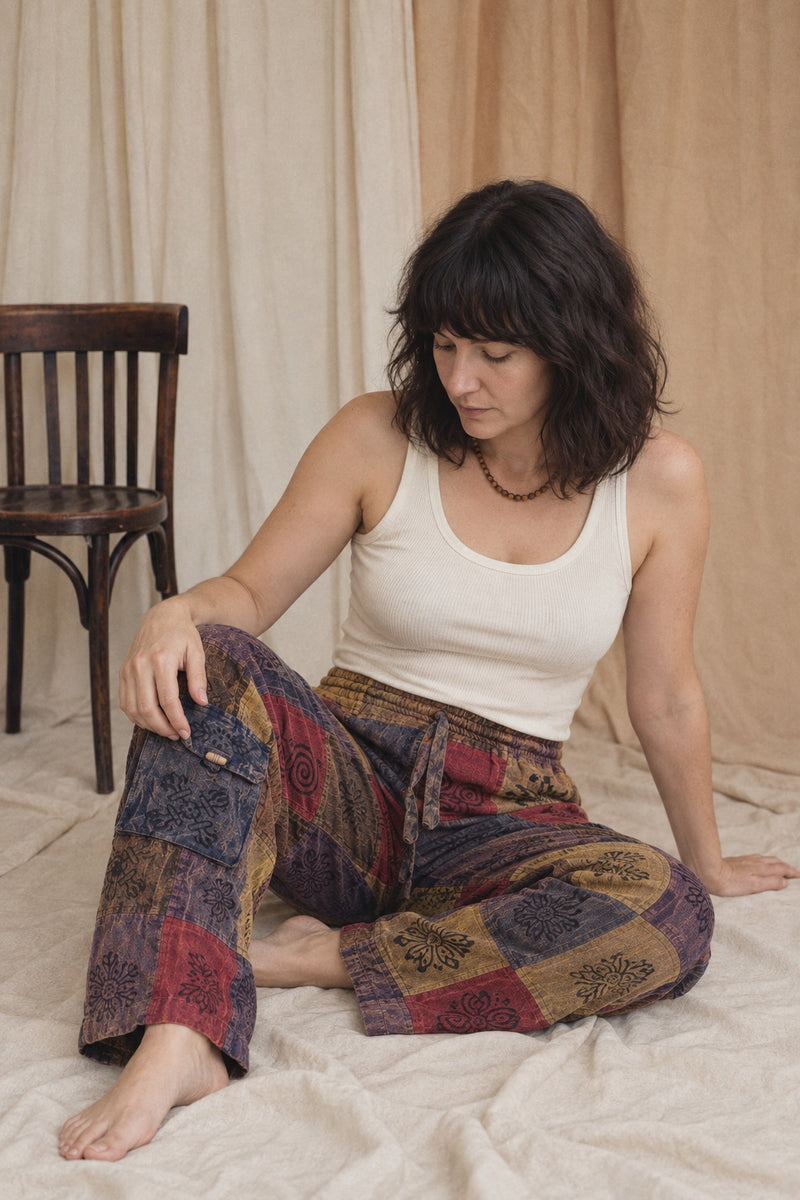 Ana wearing the Emberglow Patchwork Pants, lifestyle