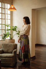 The Fern Hollow Patch Skirt at rest, full A-line sweep with the drawstring waistband.
