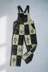 The Mosslight Overalls laid flat, full front view