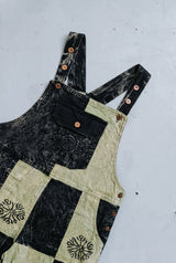 Close-up detail of the Mosslight Overalls, block print and stitching