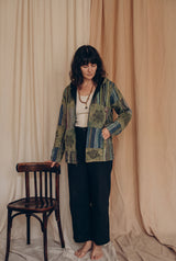 Ana wearing the Green Horizon Patchwork Jacket, studio