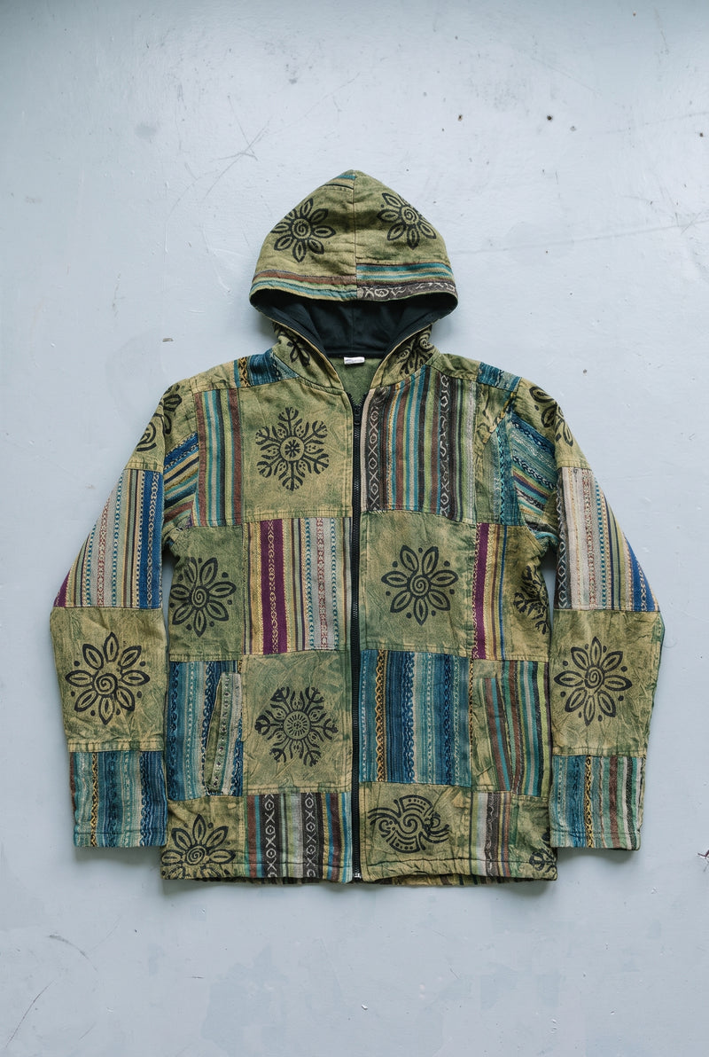 The Green Horizon Patchwork Jacket laid flat, full front view