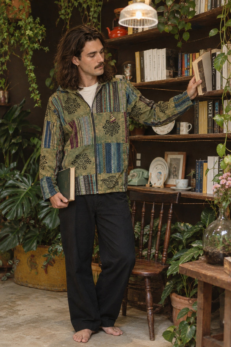 Reed wearing the Green Horizon Patchwork Jacket, lifestyle