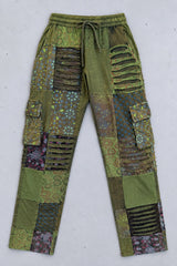 The Green Razor Patchwork Pants laid flat, full front view