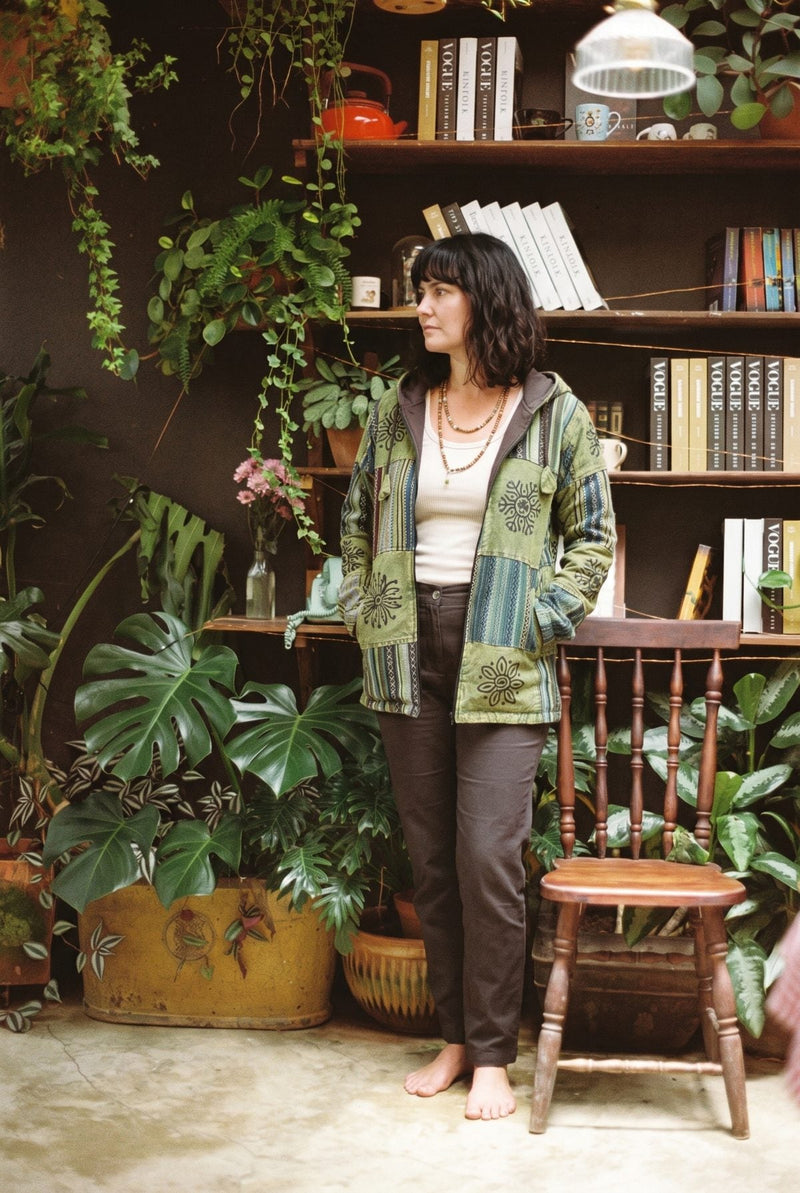 Green Horizon Patchwork Jacket worn open over a cream tank, lime gheri panels with black sunburst prints.