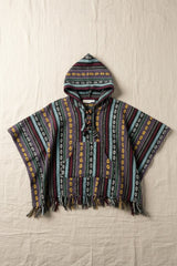Kids Enchanted Forest Poncho flat lay on linen
