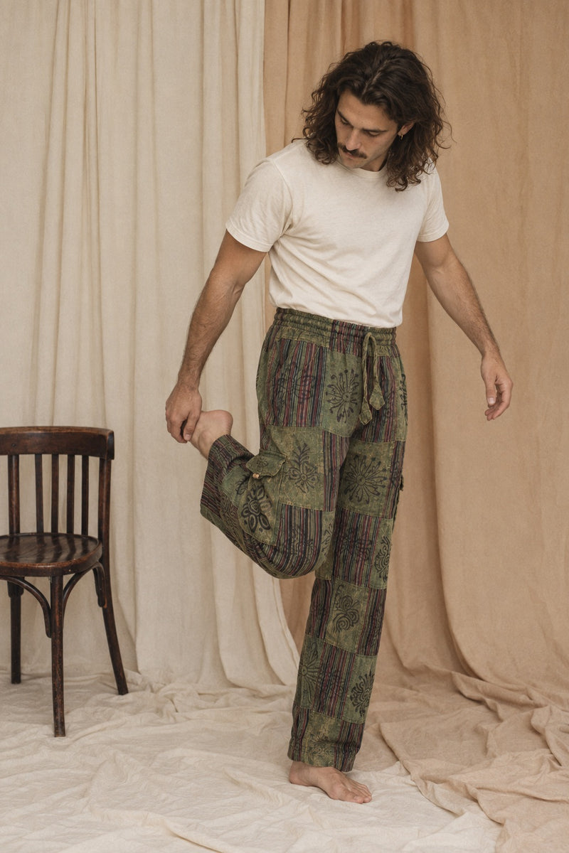 Reed wearing the Mossline Patchwork Pants, lifestyle