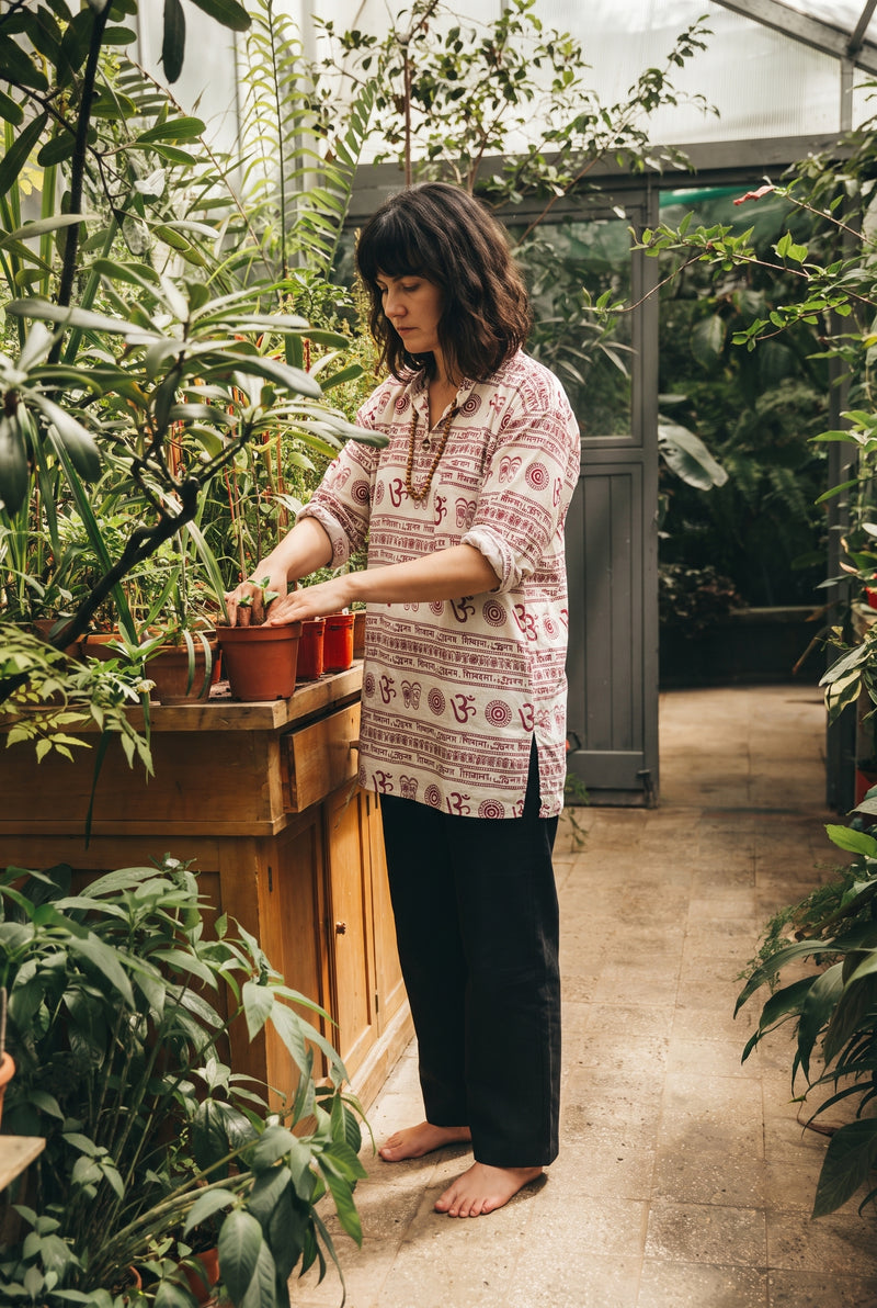 Ana wearing the OM Nepalese Shirt, plant room