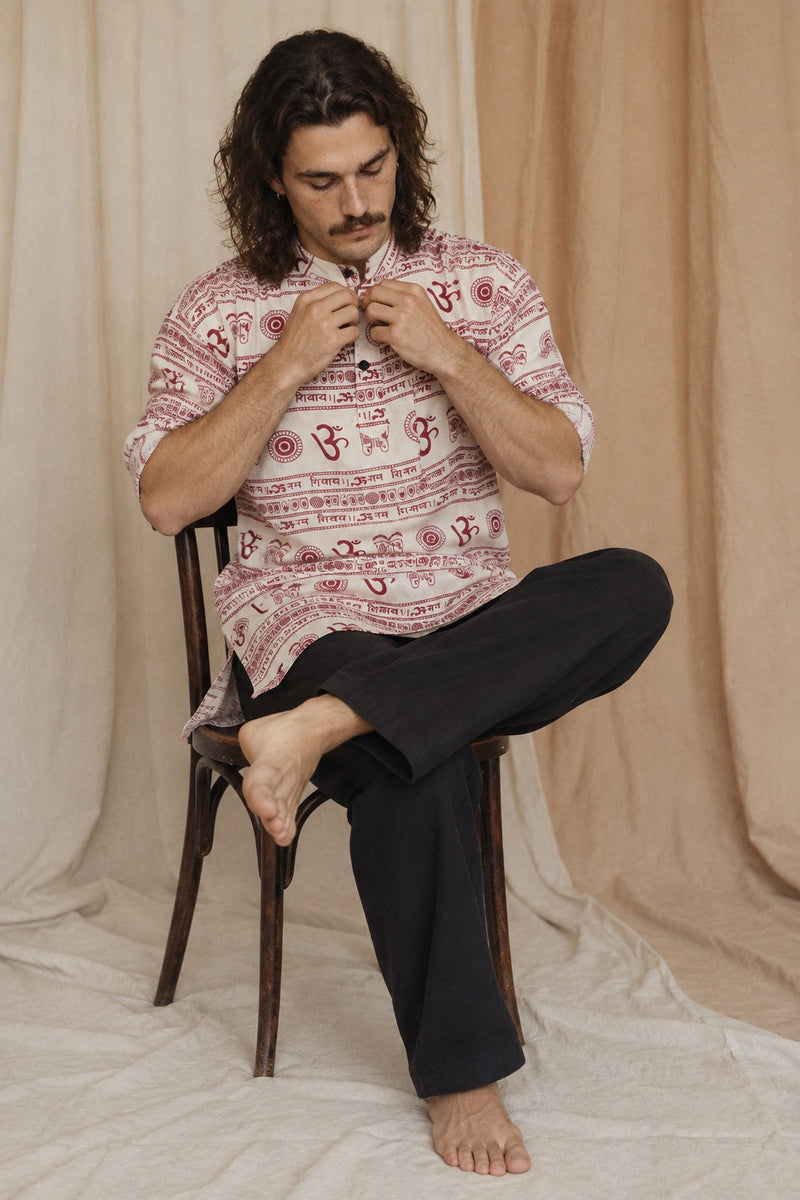 Reed wearing the OM Nepalese Shirt, studio