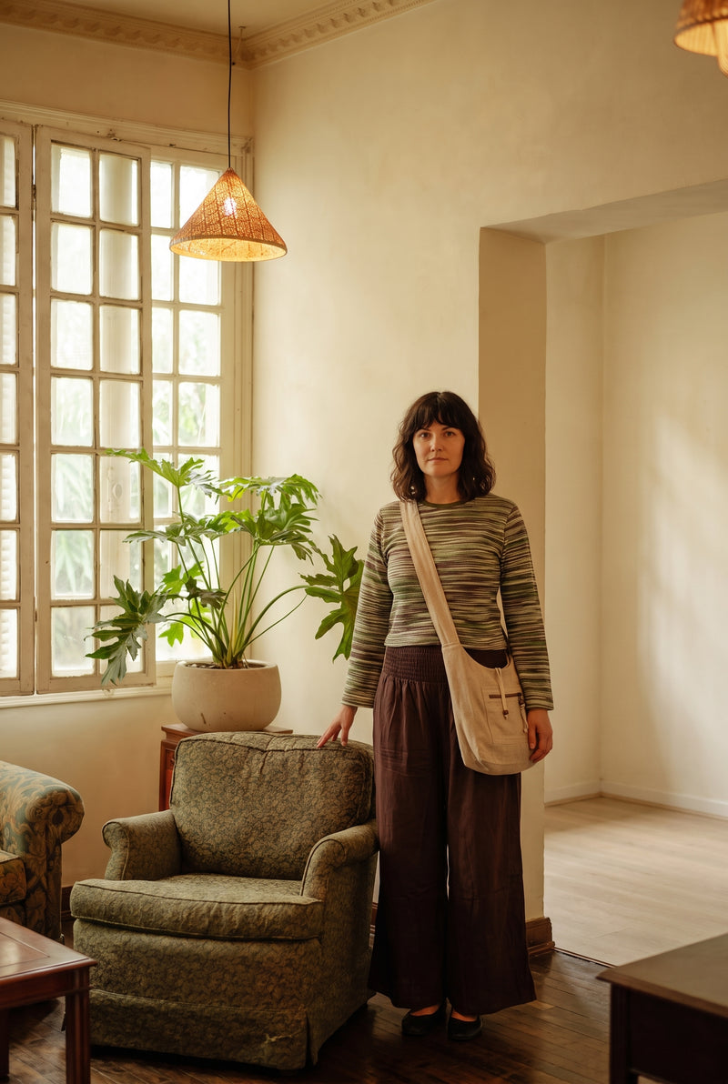 Outfit: Lichen Knit Top in Moss with Peatfield Wide-Leg Pants in Cocoa and the Nomad Hemp Sling Bag.