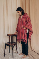 Reed wearing the Rosewood Gheri Poncho, studio
