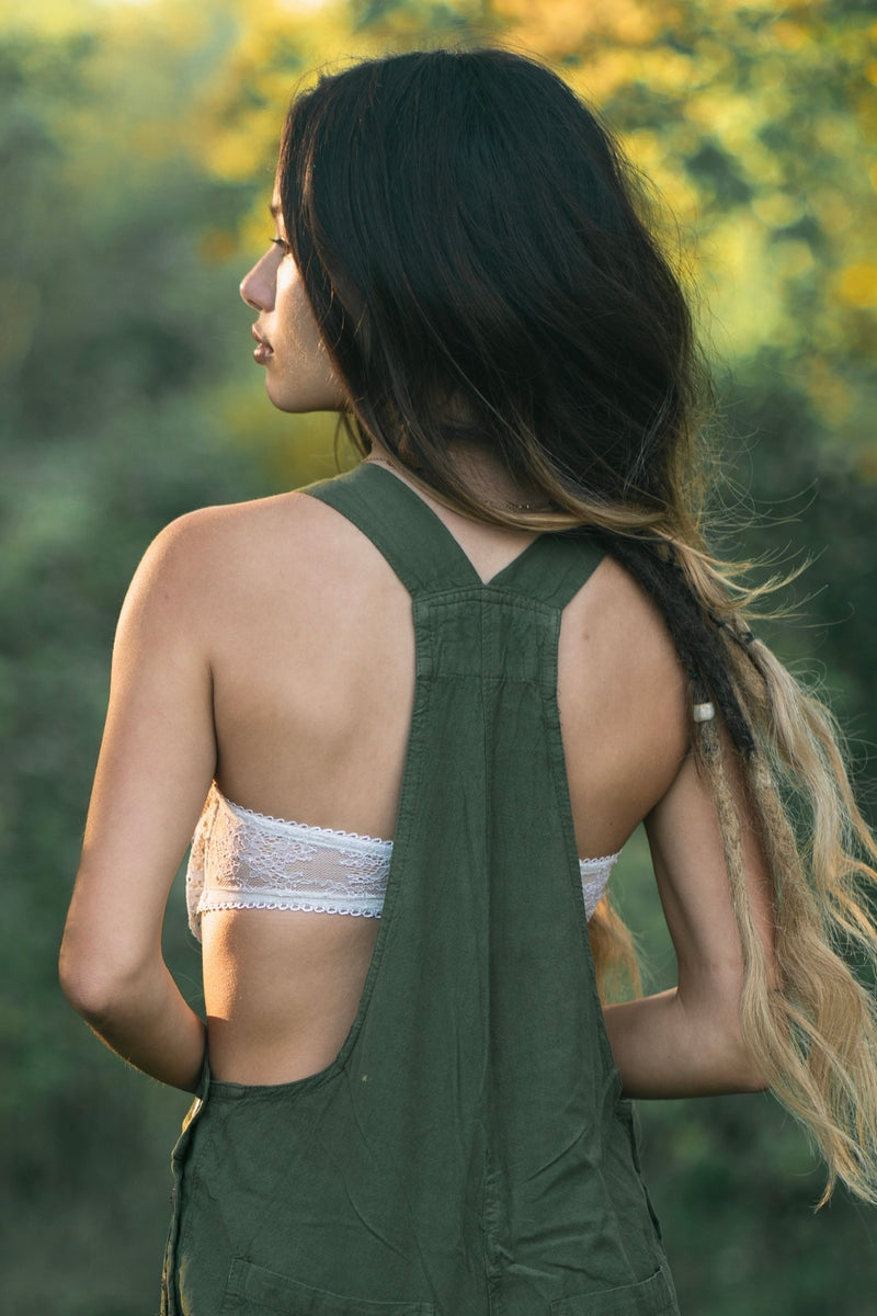 Dark green Rainforest Dress with sleeveless cut and open back design.